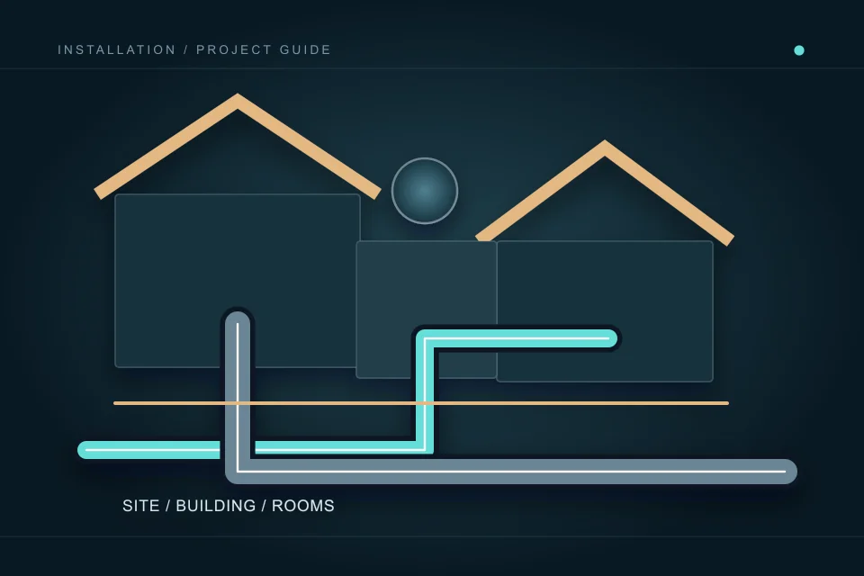 Two connected building volumes show service entry and interior system coordination across the planned rooms.