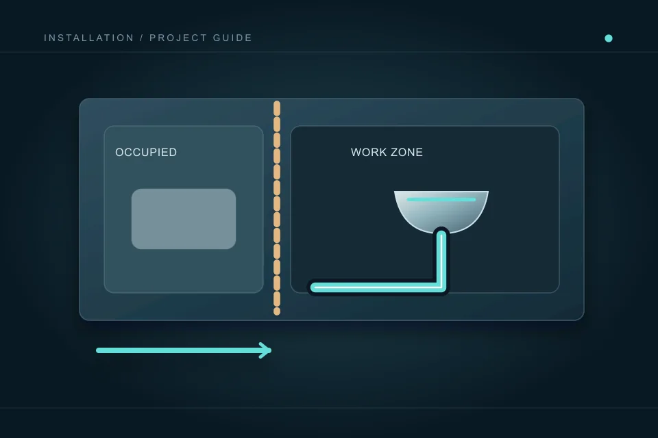 An occupied room is separated from a plumbing work zone, with a clear staged-access route below.