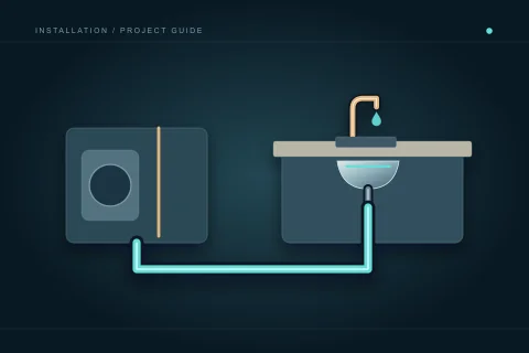 A kitchen island sink is coordinated with a separate appliance cabinet and an accessible connection route.