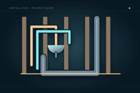 Open framing shows distinct supply lines and a larger drainage stack behind a planned basin location.